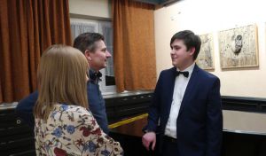 1366th  Liszt Evening - Parlour of Four Muses in Oborniki Slaskie, 21st Feb 2020<br> Michał Michalski receives congratulations from the concert listeners. Photo by Jolanta Nitka.